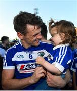 29 June 2019; John O'Loughlin of Laois with his goddaughter Lily Fitzgerald, age 1 following the GAA Football All-Ireland Senior Championship Round 3 match between Laois and Offaly at O'Moore Park in Portlaoise, Laois. Photo by Eóin Noonan/Sportsfile