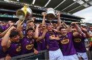30 June 2019; Wexford captain Matthew O'Hanlon with the winning Wexford minor team following the Leinster GAA Hurling Senior Championship Final match between Kilkenny and Wexford at Croke Park in Dublin. Photo by Ramsey Cardy/Sportsfile