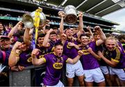 30 June 2019; The Wexford team celebrate with the winning Wexford minor team following the Leinster GAA Hurling Senior Championship Final match between Kilkenny and Wexford at Croke Park in Dublin. Photo by Ramsey Cardy/Sportsfile