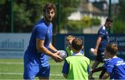 3 July 2019; Leinster player Caelan Doris with participants during the Bank of Ireland Leinster Rugby Summer Camp at Terenure RFC in Terenure, Dublin. Photo by Harry Murphy/Sportsfile