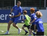 3 July 2019; Leinster player Josh Murphy with participants during the Bank of Ireland Leinster Rugby Summer Camp at Terenure RFC in Terenure, Dublin. Photo by Harry Murphy/Sportsfile