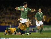 1 November 2003; Shane Horgan, Ireland, in action against Elton Flatley, Australia. 2003 Rugby World Cup, Pool A, Ireland v Australia, Telstra Dome, Melbourne, Victoria, Australia. Picture credit; Brendan Moran / SPORTSFILE *EDI*