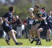 2 November 2003; Paul McGrane, Ireland, is tackled by Victoria State's Paul Kelleher and left, David Stynes. International Challange, Victoria State v Ireland, Gaelic Park, Keysborough, Melbourne, Victoria, Australia. Picture credit; Ray McManus / SPORTSFILE *EDI*