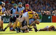 15 June 2013; David Treacy, Dublin, and Tomas Waters, Wexford, become entangled during an incident early in the game. Leinster GAA Hurling Senior Championship Quarter-Final Replay, Dublin v Wexford, Parnell Park, Dublin. Picture credit: Ray McManus / SPORTSFILE