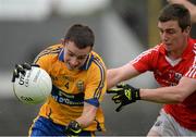 16 June 2013; Stan Lineen, Clare, in action against David Harrington, Cork. Munster GAA Football Junior Championship Semi-Final, Clare v Cork, Cusack Park, Ennis, Co. Clare. Picture credit: Matt Browne / SPORTSFILE