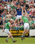 16 June 2013; David Givney, Cavan, in action against Eoin Donnelly, Fermanagh. Ulster GAA Football Senior Championship Quarter-Final, Cavan v Fermanagh, Brewster Park, Enniskillen, Co. Fermanagh. Picture credit: Oliver McVeigh / SPORTSFILE