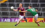 6 July 2019; Declan Kyne of Galway is tackled by Fionn McDonagh of Mayo during the GAA Football All-Ireland Senior Championship Round 4 match between Galway and Mayo at the LIT Gaelic Grounds in Limerick. Photo by Brendan Moran/Sportsfile