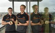 10 July 2019; The PwC GAA/GPA Players of the Month for June, footballer Jamie Brennan of Donegal, and hurler, Diarmuid O’Keeffe of Wexford, were at PwC offices in Dublin today to pick up their respective awards. The players were joined by Billy Sweetman, PwC Wexford, Leinster GAA Chairman, Jim Bolger, and GPA Chief Executive, Paul Flynn. Pictured are Diarmuid O’Keeffe of Wexford. right, and Jamie Brennan of Donegal with their awards at PwC Spencer Dock, North Wall Quay, Dublin 1.  Photo by Sam Barnes/Sportsfile