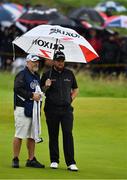 19 July 2019; Shane Lowry of Ireland, with caddy Brian Martin, on the 13th green during Day Two of the 148th Open Championship at Royal Portrush in Portrush, Co Antrim. Photo by Brendan Moran/Sportsfile