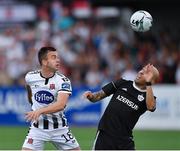 24 July 2019; Robbie Benson of Dundalk in action against Richard Almeida of Qarabag FK during the UEFA Champions League Second Qualifying Round 1st Leg match between Dundalk and Qarabag FK at Oriel Park in Dundalk, Louth. Photo by Seb Daly/Sportsfile