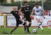24 July 2019; Patrick McEleney of Dundalk in action against Richard Almeida, left, and Abdullah Zoubir of Qarabag FK during the UEFA Champions League Second Qualifying Round 1st Leg match between Dundalk and Qarabag FK at Oriel Park in Dundalk, Louth. Photo by Ben McShane/Sportsfile