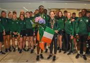 29 July 2019; Rhasidat Adeleke of Ireland with her 100m and 200m gold medals and Molly Mayne of Ireland with her 100m and 200m breaststroke Bronze medals pose for a team photo on Team Ireland's return to Dublin Airport in Dublin from the 2019 Summer European Youth Olympic Festival in Baku. Photo by Harry Murphy/Sportsfile