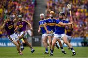 28 July 2019; Dan McCormack of Tipperary in action against Diarmuid O'Keeffe of Wexford during the GAA Hurling All-Ireland Senior Championship Semi Final match between Wexford and Tipperary at Croke Park in Dublin. Photo by Ramsey Cardy/Sportsfile