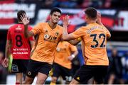 1 August 2019; Raúl Jiménez of Wolverhampton Wanderers, left, celebrates with team-mate Leander Dendoncker after scoring his side's first goal during the UEFA Europa League 2nd Qualifying Round 2nd Leg match between Crusaders and Wolverhampton Wanderers at Seaview in Belfast, Co Antrim. Photo by Oliver McVeigh/Sportsfile