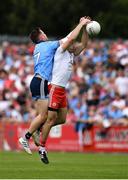 4 August 2019; Michael Cassidy of Tyrone in action against Robert McDaid of Dublin during the GAA Football All-Ireland Senior Championship Quarter-Final Group 2 Phase 3 match between Tyrone and Dublin at Healy Park in Omagh, Tyrone. Photo by Brendan Moran/Sportsfile