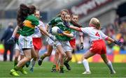 11 August 2019; Ciara Parker, St Columban’s PS, Belcoo, Fermanagh, representing Kerry, in action against Kate Murray, Clooneyquinn NS, Castlerea, Roscommon, representing Tyrone, during the INTO Cumann na mBunscol GAA Respect Exhibition Go Games during the GAA Football All-Ireland Senior Championship Semi-Final match between Kerry and Tyrone at Croke Park in Dublin. Photo by Brendan Moran/Sportsfile