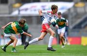 11 August 2019; Jamie Dorr, Scoil Mhuire, Newtownforbes, Longford, representing Tyrone,  in action against James O'Malley, Lisnagry NS, Lisnagry, Limerick, representing Kerry, during the INTO Cumann na mBunscol GAA Respect Exhibition Go Games during the GAA Football All-Ireland Senior Championship Semi-Final match between Kerry and Tyrone at Croke Park in Dublin. Photo by Piaras Ó Mídheach/Sportsfile