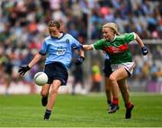 10 August 2019; Maggie Holland, Rampark NS, Dundalk, Louth, representing Dublin, in action against Lilly Murray, Ballymurray NS, Ballymurray, Roscommon, representing Mayo, during the INTO Cumann na mBunscol GAA Respect Exhibition Go Games during the GAA Football All-Ireland Senior Championship Semi-Final match between Dublin and Mayo at Croke Park in Dublin. Photo by Ray McManus/Sportsfile