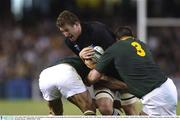 8 November 2003; Chris Jack, New Zealand, in action against Corne Krige, left, and Faan Rautenbach (3), South Africa. 2003 Rugby World Cup, Quarter Final, New Zealand v South Africa, Telstra Dome, Melbourne, Victoria, Australia. Picture credit; Brendan Moran / SPORTSFILE *EDI*