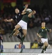 8 November 2003; Jaco van der Westhuyzen, South Africa, in action against Leon MacDonald, New Zealand. 2003 Rugby World Cup, Quarter Final, New Zealand v South Africa, Telstra Dome, Melbourne, Victoria, Australia. Picture credit; Brendan Moran / SPORTSFILE *EDI*