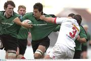 8 November 2003; Mike McCarthy, Connacht, is tackled by Ulster's Rob Moore. Celtic League Tournament, Connacht v Ulster, Sportsground, Galway. Picture credit; Matt Browne / SPORTSFILE *EDI*