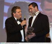 7 November 2003; Adrian Logan and GPA Player of the Year Steven McDonnell pictured at the Carphone Warehouse sponsored GPA Gala night featuring the Seat Player of Year Awards, Burlington Hotel, Dublin. Picture credit; Ray McManus / SPORTSFILE *EDI*