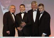 7 November 2003; GPA Hurler of the Year JJ Delaney, An Taoiseach Bertie Ahern T.D., George Wallace, General manager SEAT and GPA Chief Executive Dessie Farrell at the Carphone Warehouse sponsored GPA Gala night featuring the Seat Player of Year Awards, Burlington Hotel, Dublin. Picture credit; Ray McManus / SPORTSFILE *EDI*