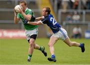 16 June 2013; Tommy McElroy, Fermanagh, in action against Martin O'Reilly, Cavan. Ulster GAA Football Senior Championship Quarter-Final, Cavan v Fermanagh, Brewster Park, Enniskillen, Co. Fermanagh. Picture credit: Oliver McVeigh / SPORTSFILE