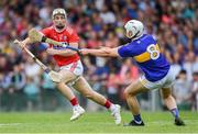 24 August 2019; Tommy O’Connell of Cork gets past Ciarán Connolly of Tipperary before scoring his side's first goal during the Bord Gáis Energy GAA Hurling All-Ireland U20 Championship Final match between Cork and Tipperary at LIT Gaelic Grounds in Limerick. Photo by Piaras Ó Mídheach/Sportsfile