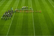 25 August 2019; Both teams match behind the Artane band prior to the TG4 All-Ireland Ladies Senior Football Championship Semi-Final match between Dublin and Cork at Croke Park in Dublin. Photo by Eóin Noonan/Sportsfile