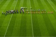 25 August 2019; Both teams match behind the Artane band prior to the TG4 All-Ireland Ladies Senior Football Championship Semi-Final match between Dublin and Cork at Croke Park in Dublin. Photo by Eóin Noonan/Sportsfile