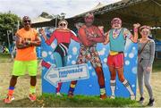 1 September 2019; Mr Motivator poses for a photograph with festival-goers, Tanya Murphy, Teresa Greene and Tasha Galvin from Waterford United, at the Electric Ireland Throwback Stage during day three of Electric Picnic 2019 at Stradbally in Laois. Lycra Legend Mr Motivator brings the energy to Electric Ireland’s Throwback Stage. Fitness Fanatic Mr Motivator got the crowd revived at the final day of Electric Ireland’s Throwback Stage. The lycra legend brought the crowd’s energy levels up for one more day of retro fun. This year, Electric Ireland’s Throwback Stage hosts a line-up of legends including headliners Bonnie Tyler, N-Trance, Mr. Motivator and Lords of Strut. One of the most popular stages at the festival, Electric Ireland’s Throwback Stage has previously played host to pop legends B*witched, Johnny Logan, Heather Small, 5ive, S Club Party, Ace of Base, 2 Unlimited, The Vengaboys and Bananarama – to name a few. Share in the nostalgia of the Electric Ireland Throwback Stage, visit: www.twitter.com/ElectricIreland, www.facebook.com/ElectricIreland, www.instagram.com/ElectricIreland.  #ThrowbackThrowdown. Photo by Sam Barnes/Sportsfile
