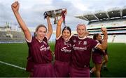 8 September 2019; Lorraine Ryan, left, Heather Cooney, centre, Sarah Dervan of Galway with the O'Duffy Cup following the Liberty Insurance All-Ireland Senior Camogie Championship Final match between Galway and Kilkenny at Croke Park in Dublin. Photo by Ramsey Cardy/Sportsfile