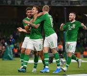 10 September 2019; James Collins of Republic of Ireland is congratulated by team-mates Enda Stevens, left, and James McClean, centre, after scoring his side's third goal during the 3 International Friendly match between Republic of Ireland and Bulgaria at Aviva Stadium, Dublin. Photo by Seb Daly/Sportsfile