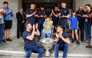 15 September 2019; Mary Rose O'Connell, age 12, from Co Waterford pictured with Dublin players, back row, from left, Con O'Callaghan, Cian O'Sullivan, Brian Howard, Rob McDaid and front row Jack McCaffrey, left, and Eoin Murchan and the Sam Maguire Cup on a visit by the All-Ireland Senior Football Champions to the Children's Health Ireland at Crumlin in Dublin. Photo by David Fitzgerald/Sportsfile