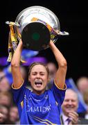 15 September 2019; Tipperary captain Samantha Lambert lifts the the Mary Quinn Memorial Cup after the TG4 All-Ireland Ladies Football Intermediate Championship Final match between Meath andTipperary at Croke Park in Dublin. Photo by Piaras Ó Mídheach/Sportsfile