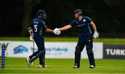 16 September 2019; Kyle Coetzer, left, and George Munsey of Scotland celebrate a partnership of 100 runs during the T20 International Tri Series match between Scotland and Netherlands at Malahide Cricket Club in Dublin. Photo by Sam Barnes/Sportsfile