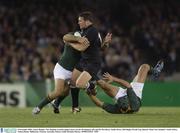 8 November 2003; Aaron Mauger, New Zealand, in action against Joost van der Westhuizen, left, and De Wet Barry, South Africa. 2003 Rugby World Cup, Quarter Final, New Zealand v South Africa, Telstra Dome, Melbourne, Victoria, Australia. Picture credit; Brendan Moran / SPORTSFILE *EDI*