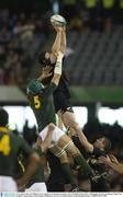 8 November 2003; Ali Williams, New Zealand, wins the lineout against Victor Matfield, South Africa. 2003 Rugby World Cup, Quarter Final, New Zealand v South Africa, Telstra Dome, Melbourne, Victoria, Australia. Picture credit; Brendan Moran / SPORTSFILE *EDI*