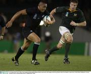 8 November 2003; Jerry Collins, New Zealand, in action against Bakkies Botha, South Africa. 2003 Rugby World Cup, Quarter Final, New Zealand v South Africa, Telstra Dome, Melbourne, Victoria, Australia. Picture credit; Brendan Moran / SPORTSFILE *EDI*
