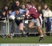 16 November 2003; Kevin Golden, Dublin, in action against Westmeath's David Mitchell. GAA Challenge Match, Dublin v Westmeath, St. Jude's GAA Club, Dublin. Picture credit; Pat Murphy / SPORTSFILE *EDI*