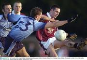 16 November 2003; Fergal Wilson, Westmeath, in action against Dublin's Brendan Phelan. GAA Challenge Match, Dublin v Westmeath, St. Jude's GAA Club, Dublin. Picture credit; Pat Murphy / SPORTSFILE *EDI*