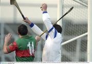 16 November 2003; John Lyons, the Castletown keeper, holds possession under pressure from Birr's Johnny Pilkington. AIB Leinster Club Hurling Championship Semi-Final, Birr v Castletown, Nowlan Park, Kilkenny. Picture credit; Ray McManus / SPORTSFILE *EDI*