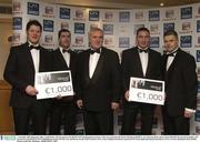 7 November 2003; Donnach Callen, Louth Hurler with his award as the REMUS GPA Hurling Representative of the Year pictured with Eamon Rainsford, REMUS, An Taoiseach, Bertie Ahern, David Mitchell, Westmeath Footballer with his award as the REMUS GPA Football Representative Of The Year and Dessie Farrell, Chief Executive, GPA, at the Carphone Warehouse sponsored GPA Gala night featuring the Seat Player of Year Awards, Burlington Hotel, Dublin. Picture credit; Ray McManus / SPORTSFILE *EDI*