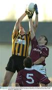 23 November 2003; Damien Broughall, Round Towers, in action against Arles-Kilcruise's James Conway. AIB Leinster Club Football Championship Semi-Final, Arles-Kilcruise v Round Towers, Dr. Cullen Park, Carlow. Picture credit; Matt Browne / SPORTSFILE *EDI*