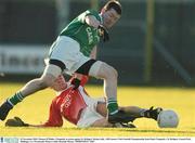 23 November 2003; Thomas O'Malley, Clonguish, in action against St. Brigid's Declan Lally. AIB Leinster Club Football Championship Semi-Final, Clonguish v St. Brigid's, Cusack Park, Mullingar, Co. Westmeath. Picture credit; Brendan Moran / SPORTSFILE *EDI*