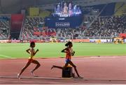 28 September 2019; Sifan Hassan of Netherlands, right, on her way to winning the Women's 10,000m final, ahead of Letesenbet Gidey of Ethiopia during day two of the World Athletics Championships 2019 at Khalifa International Stadium in Doha, Qatar. Photo by Sam Barnes/Sportsfile