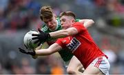 10 August 2019; Patrick Campbell of Cork in action against Dylan Thornton of Mayo during the Electric Ireland GAA Football All-Ireland Minor Championship Semi-Final match between Cork and Mayo at Croke Park in Dublin. Photo by Piaras Ó Mídheach/Sportsfile