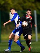 6 October 2019; Oisin Langan of Ulster Senior League in action against Darren Craven of Leinster Senior League during the FAI Michael Ward Inter League Tournament match between Leinster Senior League and Ulster Senior League at Hartstown Huntstown Football Club in Dublin. Photo by Harry Murphy/Sportsfile
