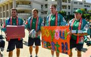 11 October 2019; Ireland players, from left, Jack Carty, Jordi Murphy, Chris Farrell and Sean Cronin with gifts that were presented to them during a visit by the squad to Kasuga Elementary School in Kusaga, Fukuoka, Japan. Photo by Brendan Moran/Sportsfile